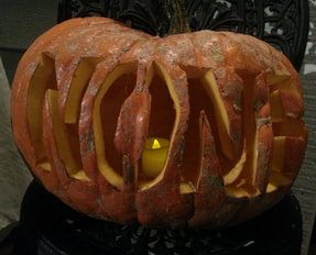 Carve the word NONE into a pumpkin to add more book title drama on Go Beyond Book Club