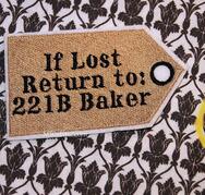 Sherlock Holmes enamel pin on Go Beyond Book Club